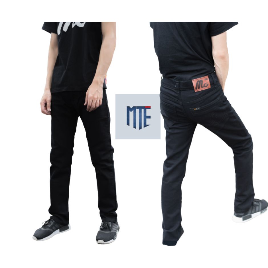 ภาพหน้าปกสินค้าMG กางเกงยีนส์ผู้ชาย ยีนส์ผู้ชาย ผ้ายืด ยีนส์ดำ ทรงกระบอกเล็ก เป้าซิป รุ่น 112/4 ยี่ห้อ MIGAL สินค้าพร้อมส่ง