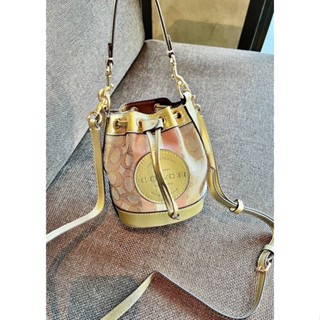 COACH MINI DEMPSEY BUCKET BAG IN SIGNATURE JACQUARD WITH STRIPE AND COACH PATCH(CF440)