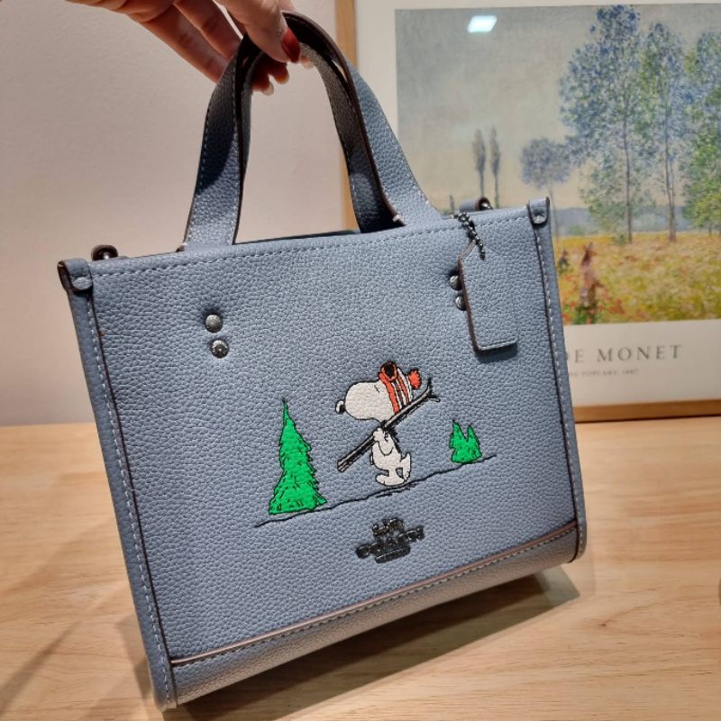 coach-x-peanuts-dempsey-tote-22-in-signature-canvas-with-snoopy-ski-motif