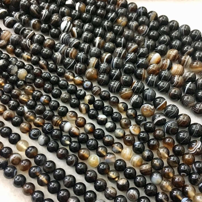 อาเกต-สีดำ-black-agate-หินเพิ่มความเชื่อมั่น-เส้นยาว-เกรด-a