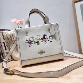 Coach X Peanuts Dempsey Tote 22 With Snoopy Present Motif