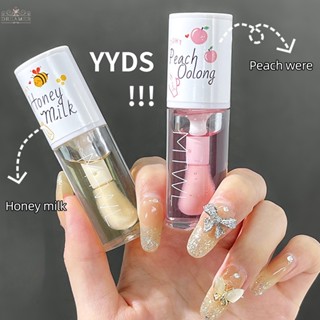 Dreamer Kawaii Honey Peach ลิปออยล์ ลิปทินท์ ให้ความชุ่มชื้น ติดทนนาน ไม่เหนียวเหนอะหนะ ซ่อมแซมริมฝีปาก