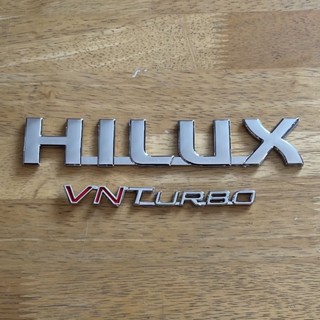 โลโก้ HILUX VN TURBO VIGO ตัวหนังสือข้างประตู (จำนวน 2 ชิ้น)