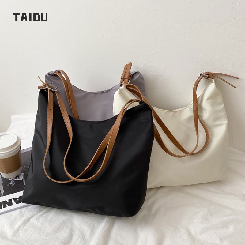 taidu-กระเป๋าผ้าใบอเนกประสงค์สไตล์เกาหลี-ใหม่กระเป๋าสะพายไหล่ของผู้หญิงทุกคน-กำลังการผลิตขนาดใหญ่-การเดินทางทำงาน-สำหรับนักศึกษา