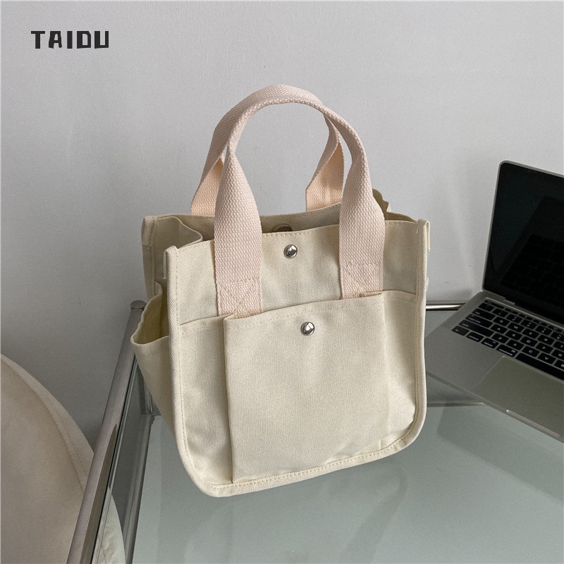 taidu-กระเป๋าแมสเซนเจอร์แบบเรียบง่ายของญี่ปุ่น-กระเป๋าผ้าใบธรรมดา-นักเรียน-แมตช์แบบสบาย-ๆ