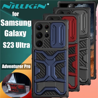 NILLKIN เคส Samsung Galaxy S23 Ultra Plus รุ่น Adventurer Pro Carbon Fiber Case Slide Camera Back With Hidden Phone Holder