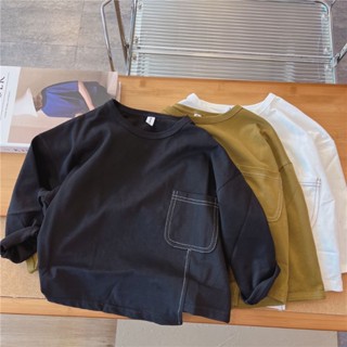 เสื้อยืดแขนยาวเด็กชาย ฤดูใบไม้ผลิ 2023 ใหม่ เด็กผู้ชาย แฟชั่นสไตล์เกาหลี สีทึบ ท่อนล่างไม่สม่ำเสมอ ท็อปส์ซู เทรนด์หล่อ