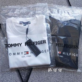 2023Tommy HiIfiger เสื้อยืดคอกลม แขนสั้น ผ้าฝ้าย พิมพ์ลายโลโก้ตัวอักษร Tommy ทรงหลวม สําหรับผู้ชาย และผู้หญิงS-5XL