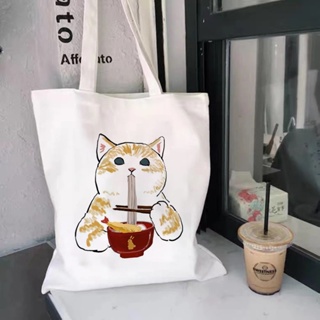 กระเป๋าช้อปปิ้ง ผ้าแคนวาส พิมพ์ลายการ์ตูนแมวน่ารัก จุของได้เยอะ สไตล์ฮาราจูกุ แฟชั่นคริสต์มาส