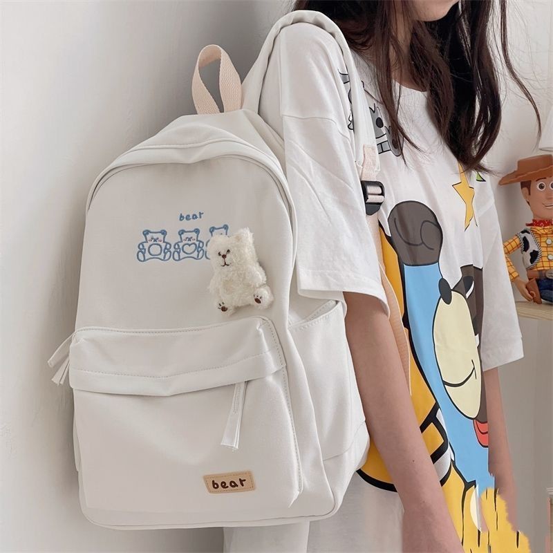 กระเป๋าแฟชั่นเกาหลีน่ารัก-hotoriginal-ins-กระเป๋าเป้สะพายหลังนักเรียนหญิงวิทยาลัยลม-simple-bear-กระเป๋าเป้สะพายหลัง