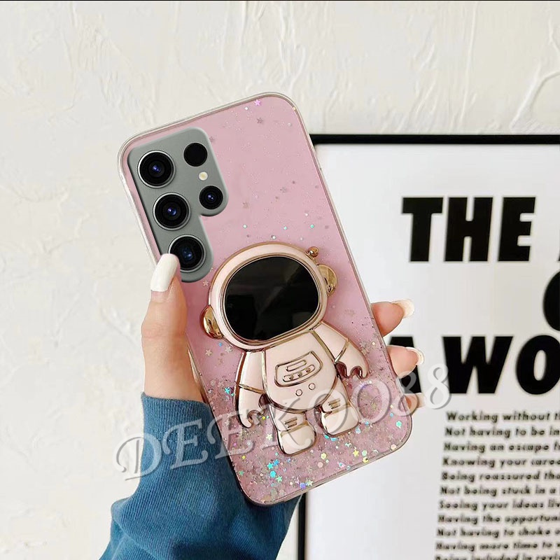 เคสโทรศัพท์มือถือ-ลายนักบินอวกาศ-ประดับเลื่อม-กลิตเตอร์-พร้อมขาตั้ง-สําหรับ-samsung-galaxy-s23-s22-ultra-plus-s23-s22-a14-a04e-4g-5g