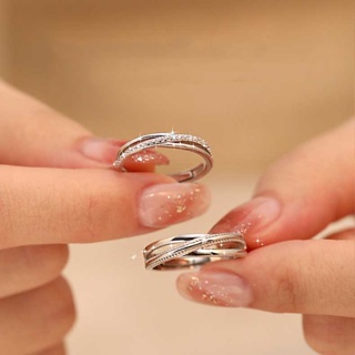 ภาพหน้าปกสินค้าแหวนหมั้นแต่งงาน เงินสเตอร์ลิง 925 ประดับเพชรคริสตัล ปรับขนาดได้ เครื่องประดับแฟชั่น สําหรับผู้ชาย และผู้หญิง ที่เกี่ยวข้อง