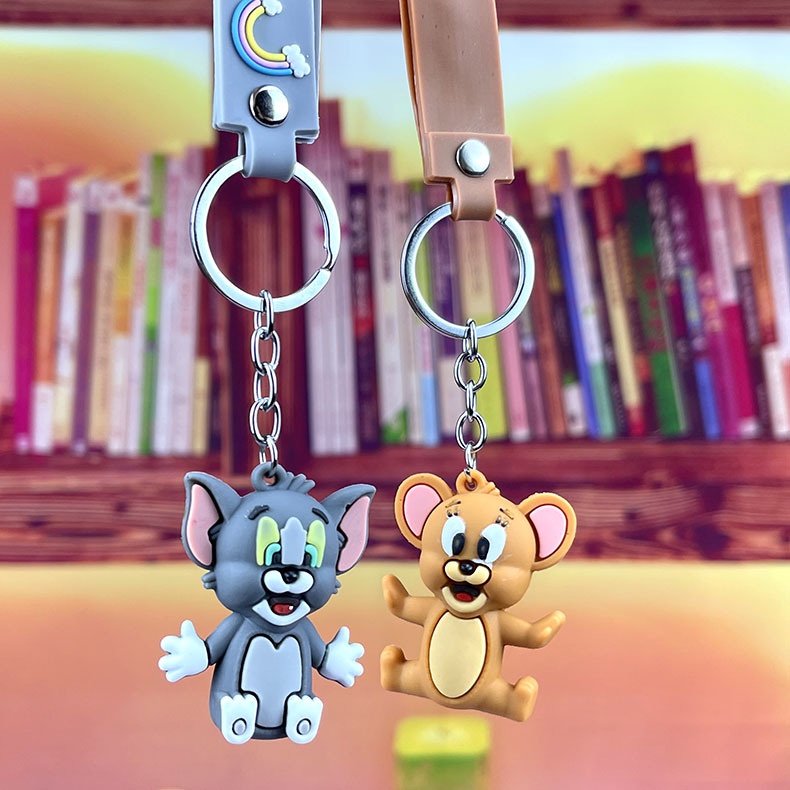 ภาพหน้าปกสินค้าFALILIAN Creative Anime Cat และ Mouse พวงกุญแจการ์ตูนตุ๊กตาตุ๊กตารถจี้กระเป๋าเครื่องประดับพวงกุญแจ จากร้าน swoan76.th บน Shopee