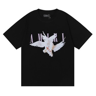 Amiri เสื้อยืดลําลอง แขนสั้น คอกลม พิมพ์ลายนกพิราบ ตัวอักษร สีชมพู ทรงหลวม สไตล์วินเทจ เหมาะกับฤดูร้อน สําหรับผู้ชาย และผู้หญิง คู่รัก