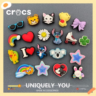 ภาพหน้าปกสินค้าCrocs jibbitz charms การ์ตูนน่ารัก รูรองเท้า ดอกไม้ DIY อุปกรณ์ตกแต่ง สําหรับ ที่เกี่ยวข้อง