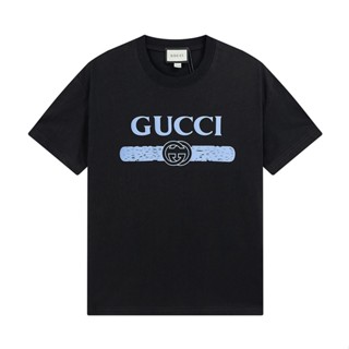 ใหม่ เสื้อยืดลําลอง แขนสั้น คอกลม ผ้าฝ้าย พิมพ์ลายโลโก้ตัวอักษร ทรงหลวม สําหรับผู้ชาย และผู้หญิง