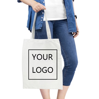 กระเป๋าช้อปปิ้ง ผ้าแคนวาส พิมพ์ลายตัวอักษร Add Your Text สีขาว แฟชั่นสําหรับทุกเพศ KJUM