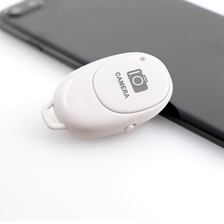 Phone Bluetooth Remote Shutter White For Smartphone รีโมท ชัตเตอร์ รีโมท บลูทูธ สำหรับถ่ายภาพ