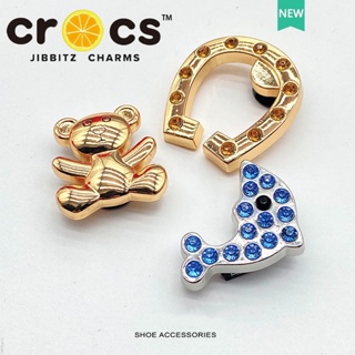 ภาพหน้าปกสินค้าJibbitz crocs charms ชุดโลมาโลหะรองเท้าหัวเข็มขัดรูรองเท้าอุปกรณ์เสริม DIY เครื่องประดับสร้างสรรค์ ที่เกี่ยวข้อง