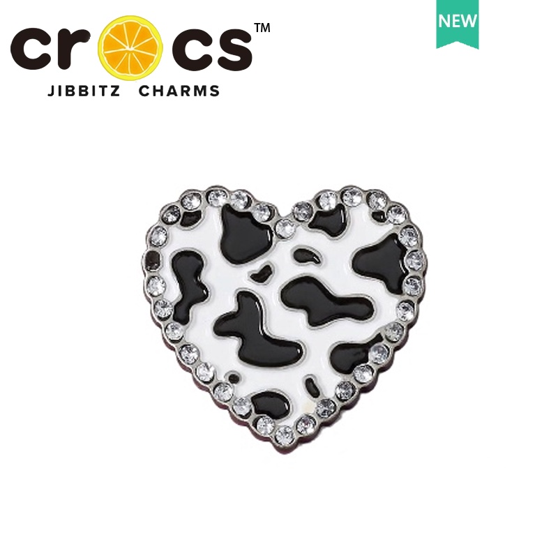 ภาพหน้าปกสินค้าJibbitz crocs charms อุปกรณ์เสริมหัวเข็มขัดโลหะ สีดํา สไตล์พังก์ สําหรับตกแต่งรองเท้า DIY 2023 จากร้าน hongping121475.th บน Shopee