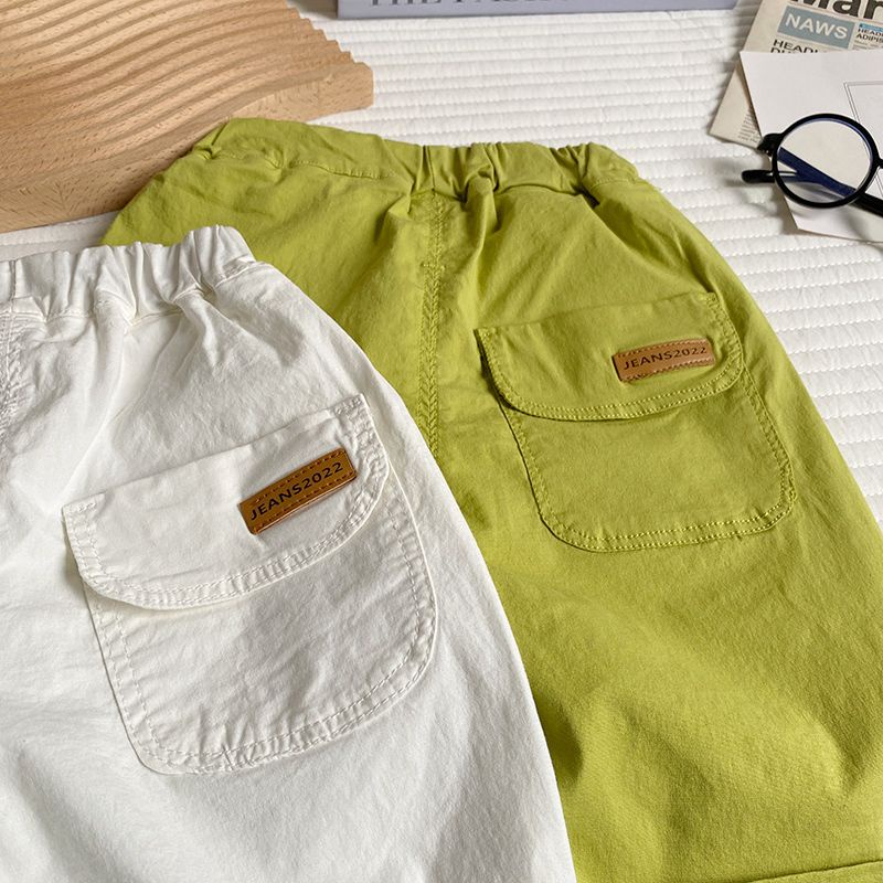 กางเกงแฟชั่นเด็กชาย-2023-ฤดูร้อนใหม่สไตล์เกาหลีลำลองกีฬากางเกงขาสั้นบางการ์ตูนกางเกงห้าจุด