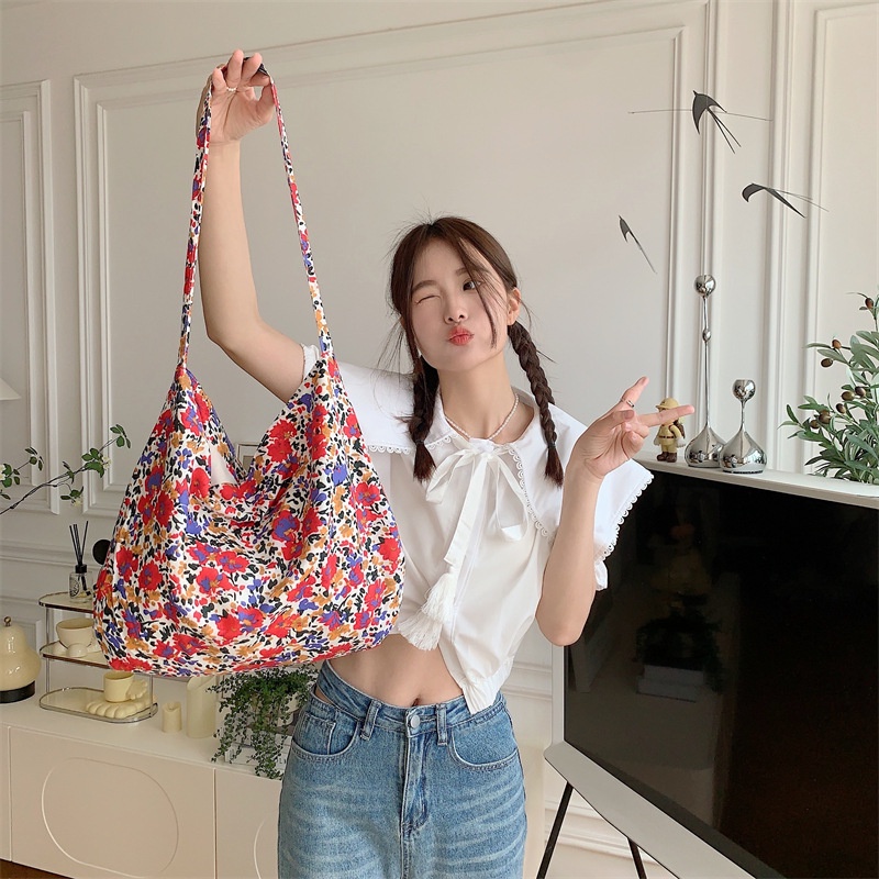 กระเป๋าถือดอกไม้ขนาดเล็กสไตล์เกาหลีกระเป๋าผ้าใบนักเรียนน่ารักความจุขนาดใหญ่