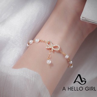 ภาพหน้าปกสินค้าA HELLO GIRL เครื่องประดับ สร้อยข้อมือ สายโซ่ ประดับโบว์ ไข่มุกคริสตัล แบบบาง คุณภาพสูง แฟชั่นสําหรับผู้หญิง ที่เกี่ยวข้อง