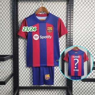 เสื้อกีฬาแขนสั้น ลายทีมชาติฟุตบอล Barcelona 2023-24 ชุดเหย้า สําหรับเด็ก