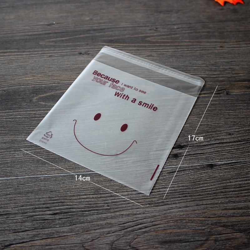 ถุงกระดาษแก้วพลาสติกใส-ลายหน้ายิ้ม-มีกาวในตัว-สําหรับใส่ขนม-คุกกี้-diy-100-ชิ้น