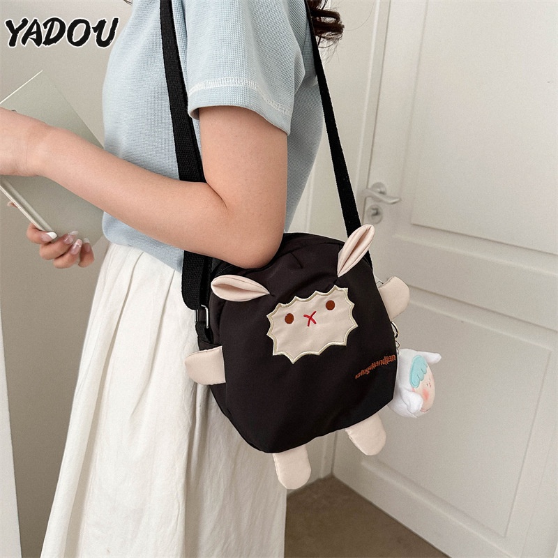 yadou-นางสาวการ์ตูนน่ารักกระเป๋าผ้าใบใหม่-ins-ญี่ปุ่นเกาหลีกระเป๋าสะพาย-messenger-พร็อพ