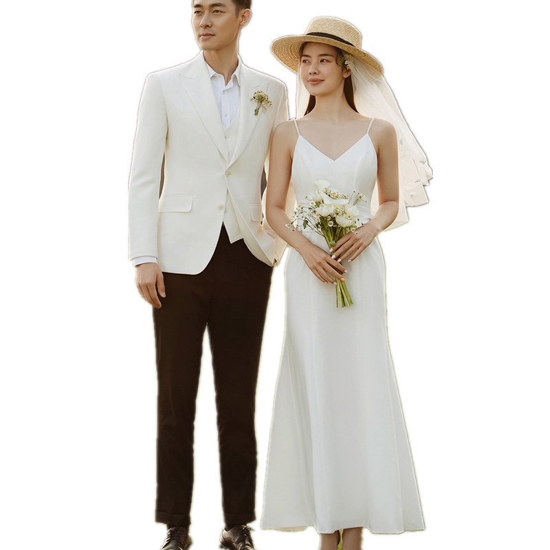 ชุดแต่งงานที่เรียบง่ายฝรั่งเศสแขนกุดใหม่แฟชั่นเจ้าสาวริมทะเลสนามหญ้าแต่งงานฮันนีมูนเดินทางชุดสีขาว