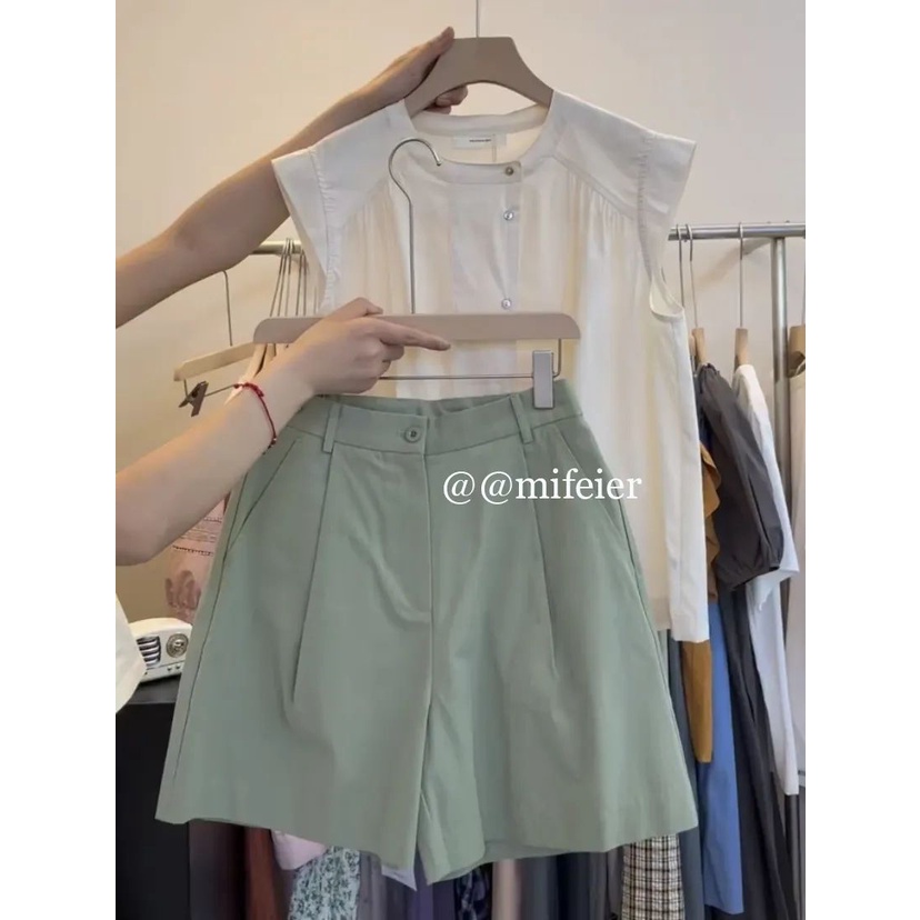 AEL Summer commutes the pure color round collar design petal sleeve lotus leaf edge short style blouse woman