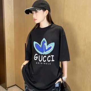 เสื้อยืดแขนสั้นลําลอง ผ้าฝ้ายแท้ พิมพ์ลายโลโก้กราฟฟิติ GUC co คุณภาพสูง แฟชั่นฤดูร้อน สําหรับผู้ชาย และผู้หญิง