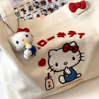 กระเป๋าสะพายไหล่ กระเป๋าช้อปปิ้ง ผ้าแคนวาส ขนาดใหญ่ จุของได้เยอะ แบบพกพา ปักลาย Hello Kitty สไตล์ญี่ปุ่น