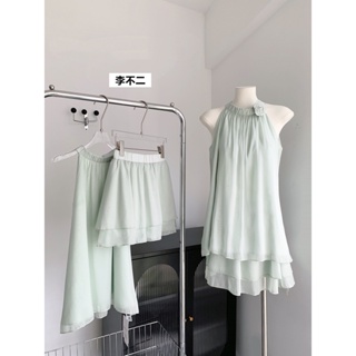 2023 summer temperament green sleeveless neck-hanging round-neck shirt with a high waist covering a skinny skirt fashion suit