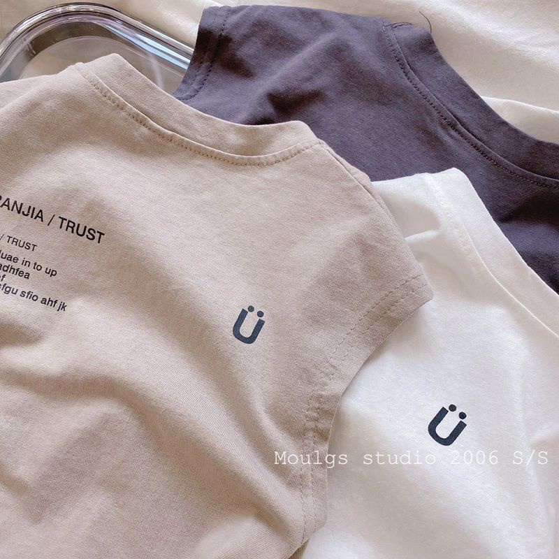 เสื้อผ้าเด็กฝ้ายบริสุทธิ์-2023-ฤดูร้อนเด็กชายใหม่ยิ้มเรียบง่ายหน้า-แขนกุด-t-shirt-เสื้อกั๊กเด็ก