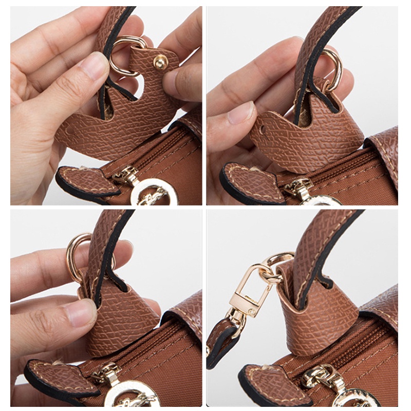 รูปภาพรายละเอียดของ F-shaped bag modified with perforated leather buckle and shoulder strap