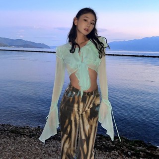 เสื้อแขนยาว ผ้าโปร่งซีทรู สีพื้น แฟชั่นฤดูใบไม้ผลิ และฤดูร้อน สไตล์ยุโรป และอเมริกา สําหรับผู้หญิง