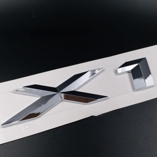 X1 สติกเกอร์ตราสัญลักษณ์ ABS สีเงิน สีดํา สําหรับติดตกแต่งรถยนต์สติกเกอร์รูปลอก ลายตราสัญลักษณ์ตัวอักษร สําหรับ BMW X 1