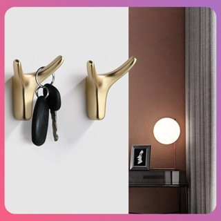 ตะขอแขวนเสื้อผ้า Creative Wall Hook ตะขอเสื้อโค้ทหรูหราสไตล์นอร์ดิกตู้รองเท้า Porch Coat Hook Single Horn Creative Punching Home เครื่องมือ [COD]