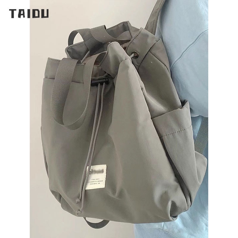 taidu-กระเป๋าถือพร็อพแฟชั่นเกาหลี-แมตช์แบบสบาย-ๆ-กระเป๋านักเรียนเป้สะพายหลังความจุขนาดใหญ่-การเดินทางของนักเรียน