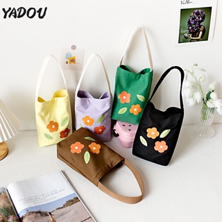 YADOU อิน ผ้าใบ กระเป๋าเด็ก เวอร์ชั่นเกาหลี กระเป๋าสะพาย กราฟฟิตี โลโก้น่ารัก