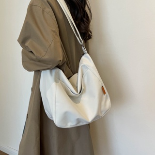กระเป๋าสะพายไหล่ ผ้าแคนวาส ขนาดใหญ่ จุของได้เยอะ แบบเรียบง่าย สไตล์เกาหลี และญี่ปุ่น สําหรับผู้หญิง มี 4 สี