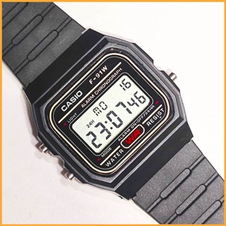 Casio นาฬิกาข้อมือดิจิทัล F-91W ทรงสี่เหลี่ยม สีทอง พร้อมสายเรซิน คุณภาพสูง และนาฬิกาจับเวลาแบ็คไลท์ สําหรับผู้ชาย