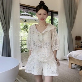 European station French temperament advanced sense suit womens summer retro hollowed-out shirt leisure lace shorts two sets