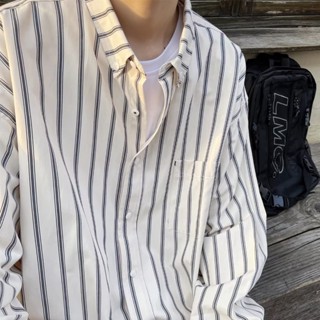 เสื้อเชิ้ตแขนยาวลําลอง ทรงหลวม ลายทาง แฟชั่นทันสมัย สําหรับผู้ชาย