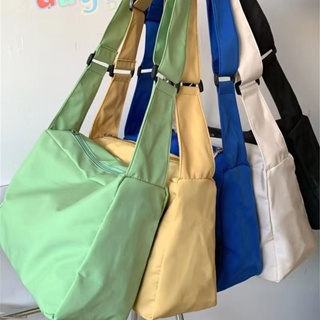 กระเป๋าสะพายไหล่ สีพื้น เข้ากับทุกการแต่งกาย สไตล์ญี่ปุ่น สําหรับผู้ชาย และผู้หญิง