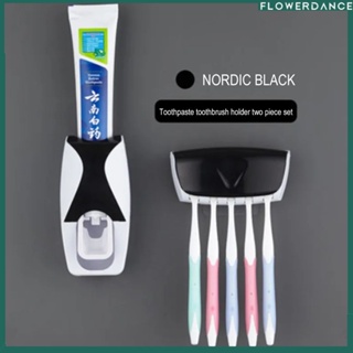 ที่วางแปรงสีฟันอัตโนมัติเครื่องจ่ายยาสีฟันชุดกันฝุ่นดูดเหนียวติดผนังบีบยาสีฟันสำหรับห้องน้ำดอกไม้