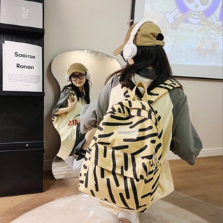 กระเป๋าเป้สะพายหลัง กระเป๋านักเรียน ผ้าแคนวาส พิมพ์ลายทาง ขนาดใหญ่ จุของได้เยอะ สไตล์เกาหลี ญี่ปุ่น ฮาราจูกุ สําหรับผู้หญิง