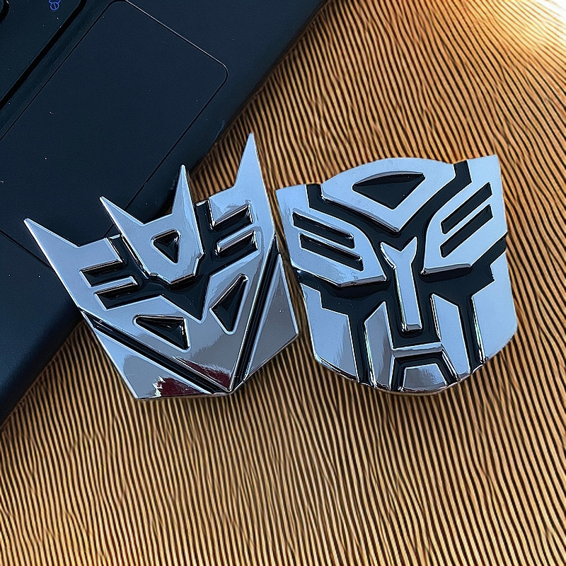 2x 3D Metall-Embleme Transformers Autobots Optimus Prime – Silber, Chrom, Selbstklebend | Für Auto, Motorrad & Mehr